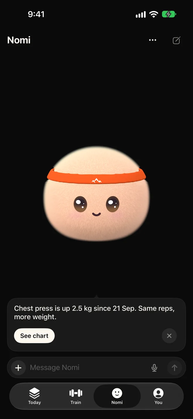 Nomi in the NOMAE app, pointing out that chest press is up 2.5 kg.